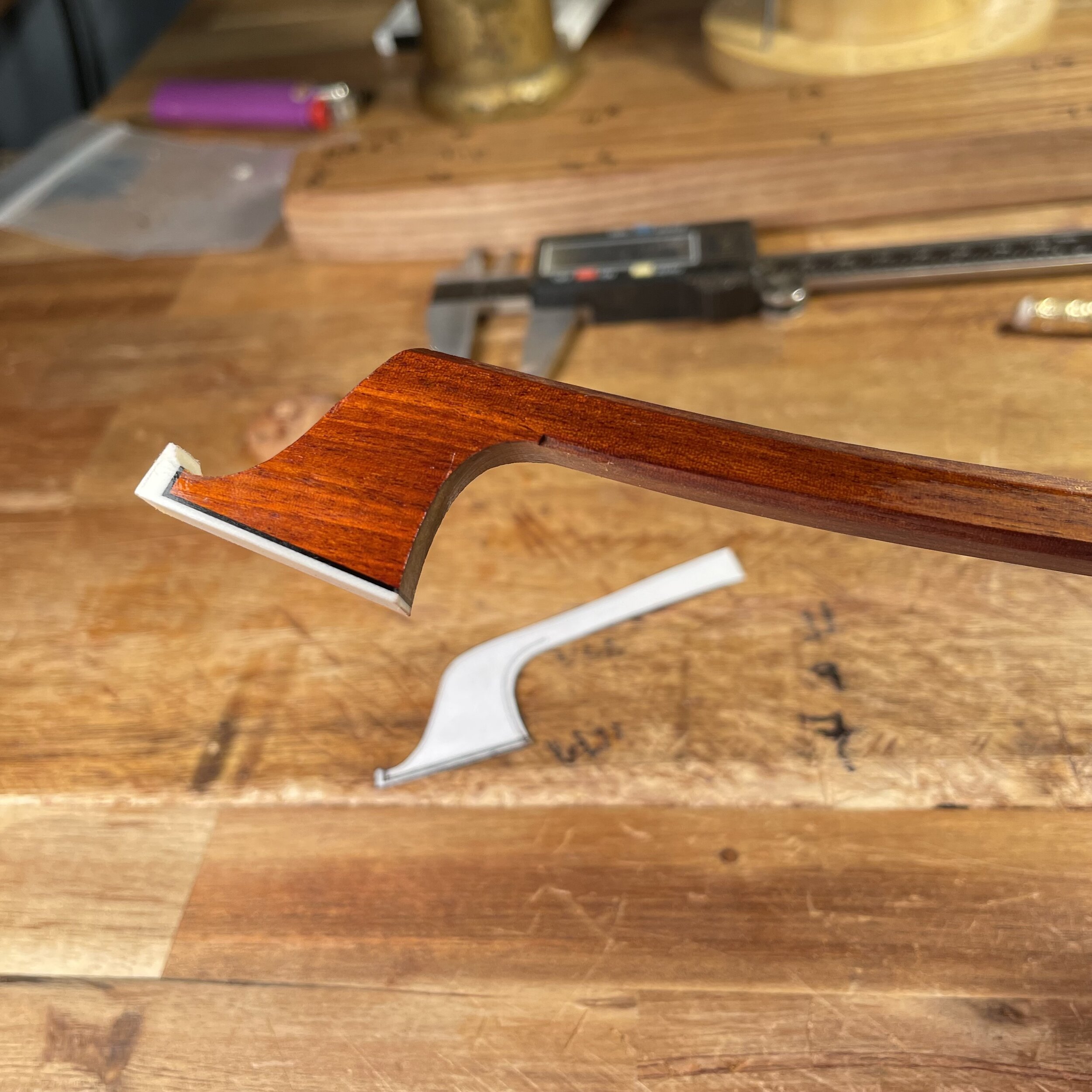 Here I am rough shaping the profile of the bow. I chose to model this cello bow after the French maker Pierre Simon who made bows during the 1800’s.&nbsp; I try to honor his style while adding a bit of my own personality to the shape.