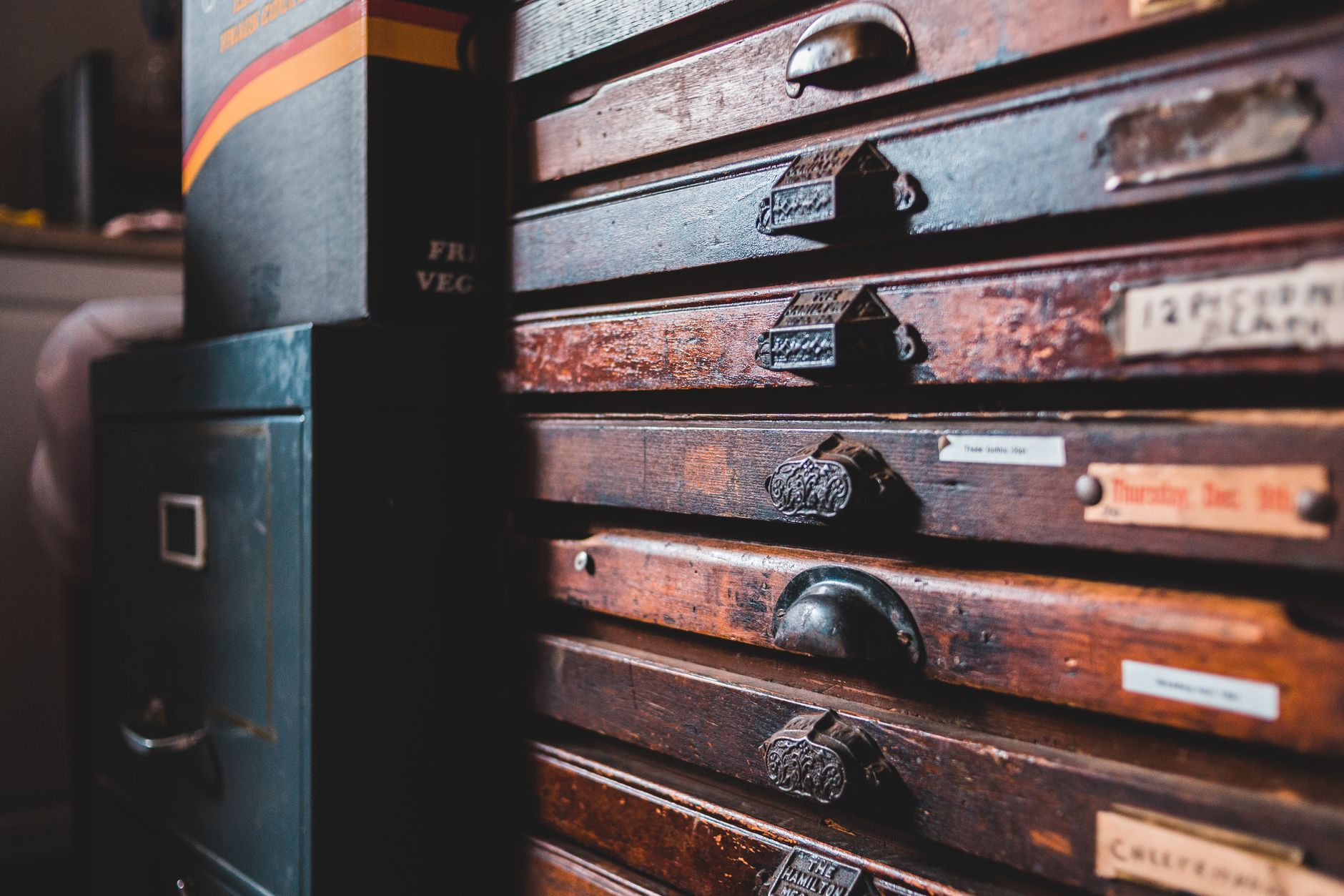 Pair of Walnut Bedside Chests — detail